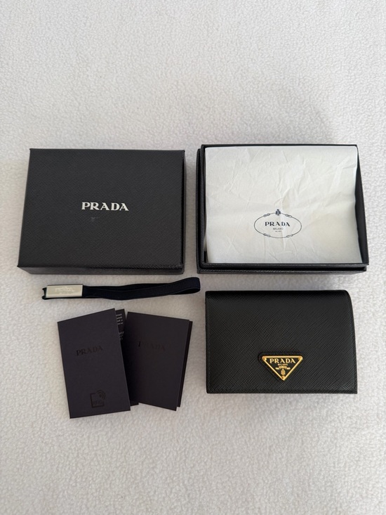 Prada Accessories - Prada Black Saffiano Leather small wallet with Gold Triangle Plaque